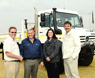 Francois Pieterse (right), Rupert Jooné and Analize van Aswegen from Anglo American Exploration Africa take ownership of their Unimog from Ferdi de Beer, technical specialist: Special Vehicles at Mercedes-Benz South Africa.