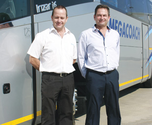 Paul Nel (left) and Leon Nelson stand proudly with the latest Mega Coach i6.