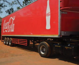 The full Coca-Cola fleet now runs side-under-run protection bars.
