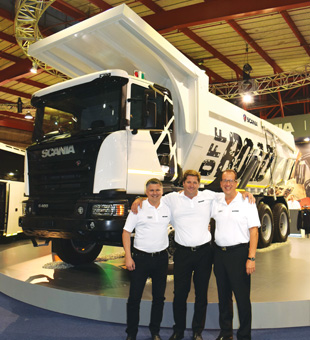  Pictured in front of a new 8x4 tipper, which offers 25-percent more payload than conventional tippers, are (from left) Taftman, Erasmus and Lehtiö.